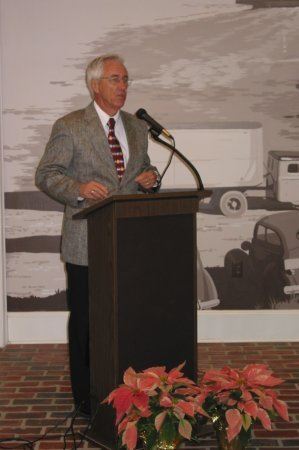 Man speaking during dedication at the podium
