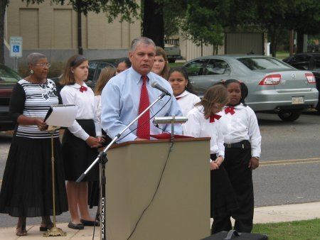 Man speaking at the dedication