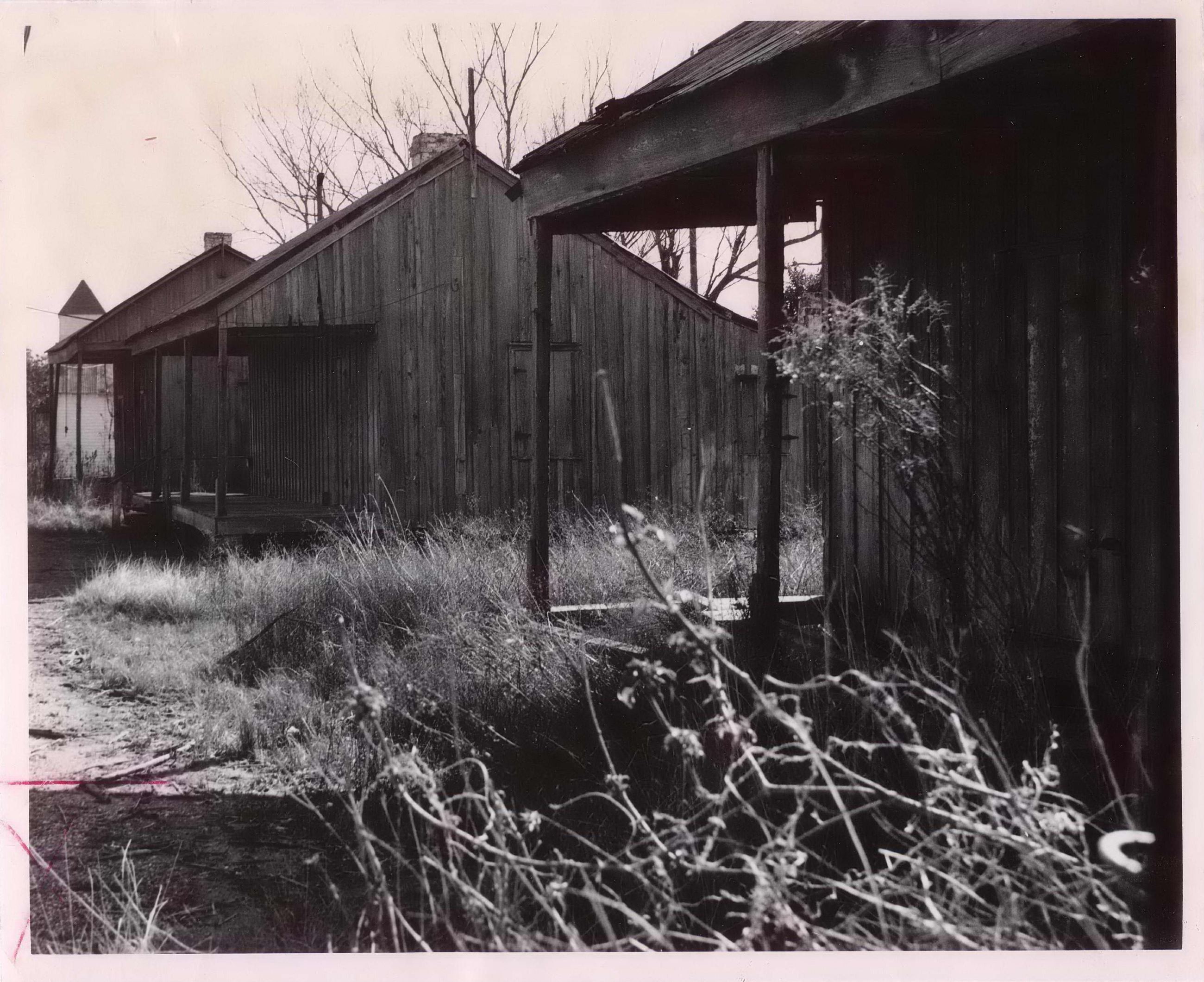 Former slave cabins and a church at Allendale, mid 20th century